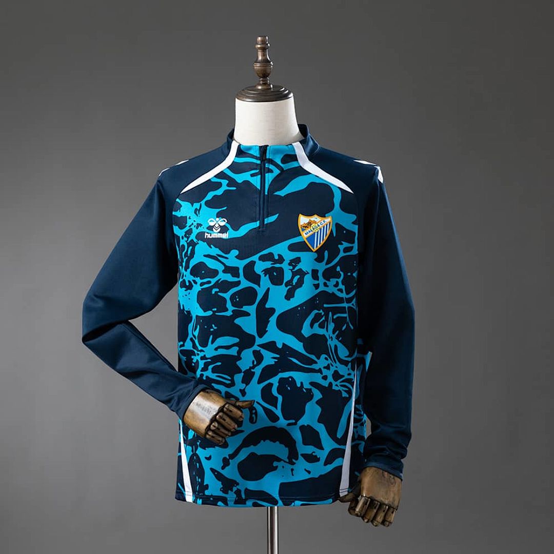 Malaga 25_26 Training Top Blue S-XXL